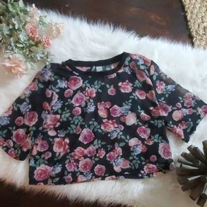 Divided semi-sheer black floral crop top